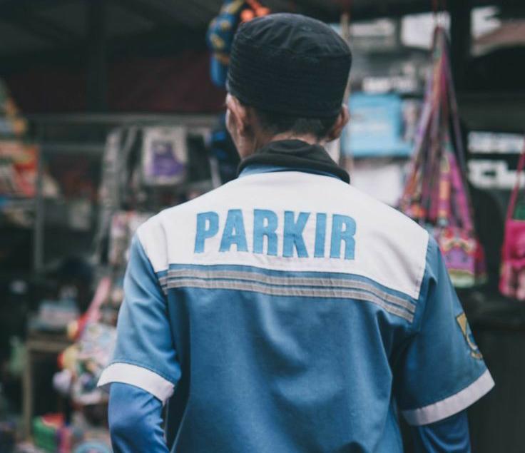 Catat! Juru Parkir Ilegal di Minimarket Bisa Terancam Penjara 9 Tahun, Ini Dasar Hukumnya