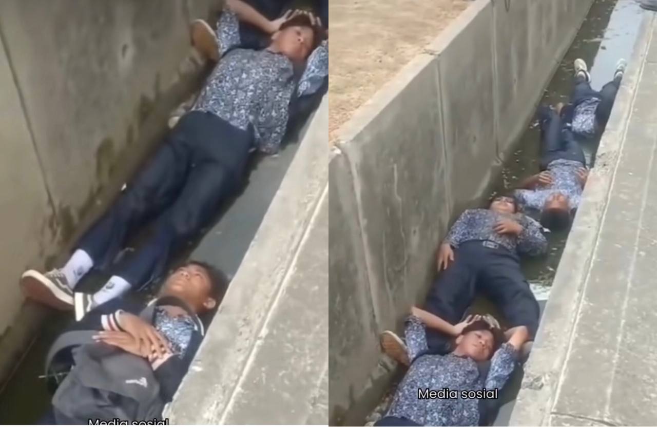 Viral! 7 Siswa Dihukum Tiduran di Selokan oleh Petugas Keamanan Gegara Balap Liar