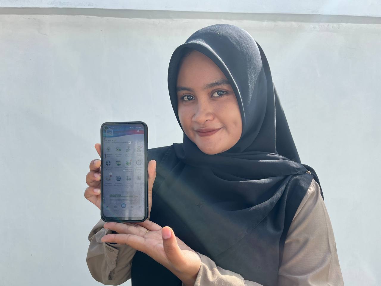 Pengkuan Mutia, Aplikasi Mobile JKN Bikin Peserta Tak Repot-Repot Ubah Data, Gampang Banget