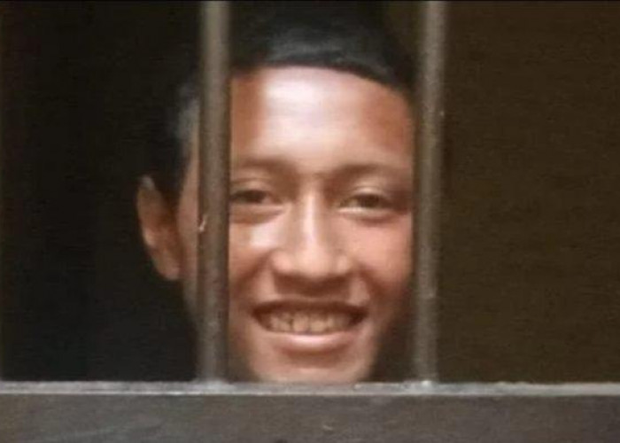 Erus ODGJ Pelaku Mutilasi ODGJ Tetap Senyum di Jeruji Tahanan Polsek
